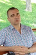Николай